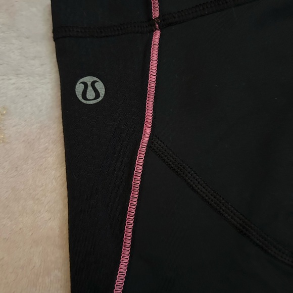 Sleek Black and Pink Leggings with Stretchy Comfort - Picture 2 of 3